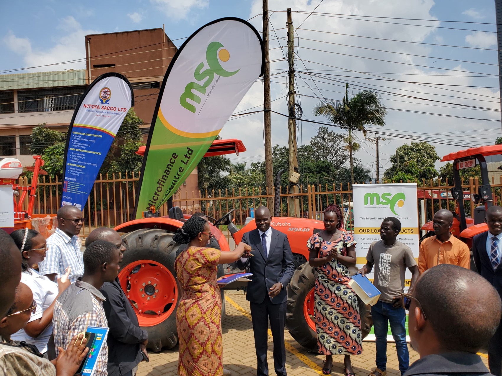 The handover moment at the Microfinance Support Centre